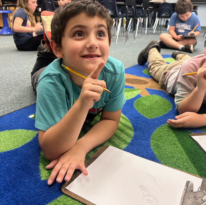 Student completes a scientific diagram about eagle adaptations.